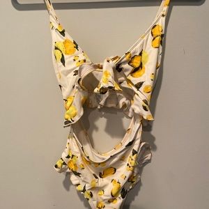 Out From Under (UO) tie front open back one piece